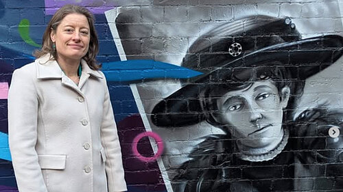 Helen Maguire at Emily Davison mural in Epsom